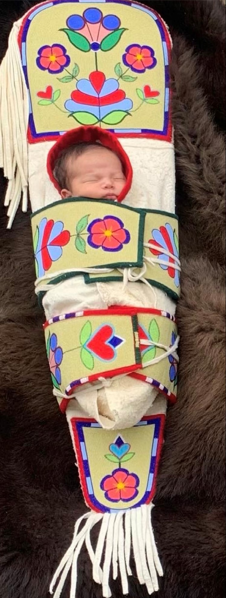 image of baby in a traditional cradleboard